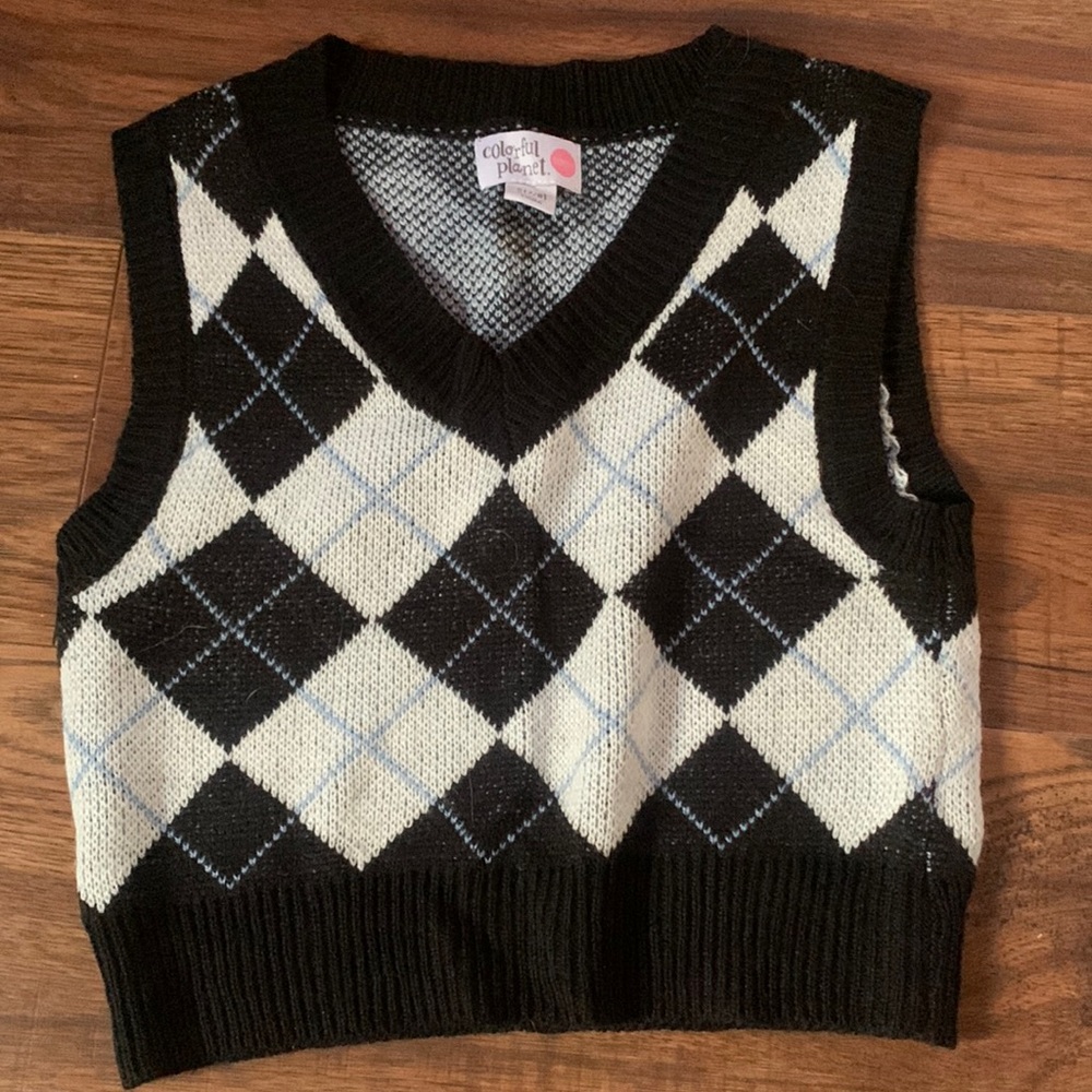 black, white, blue sleeveless vest